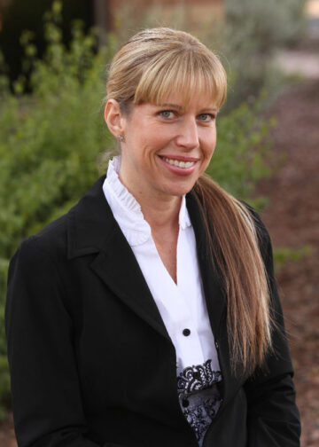 LAURA BOOZEMAN-FARIAS, PARTNER