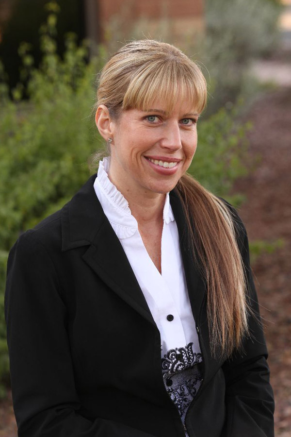 LAURA BOOZEMAN-FARIAS, PARTNER